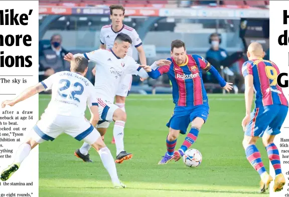  ?? LLUIS GENE/AGENCE FRANCE-PRESSE ?? BARCELONA striker Lionel Messi weaves his magic against Osasuna.