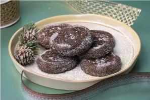  ?? (E. Jason Wambsgans/Chicago Tribune/TNS) ?? 2022 Holiday Cookie Contest winner Chocolate Salted-Caramel Surprise Cookies by Caroline Crispino.