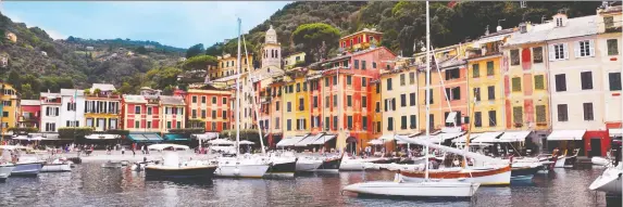  ?? STEVE MACNAULL ?? Portofino harbour in Italy is ringed by colourful tall houses and filled with a variety of boats.