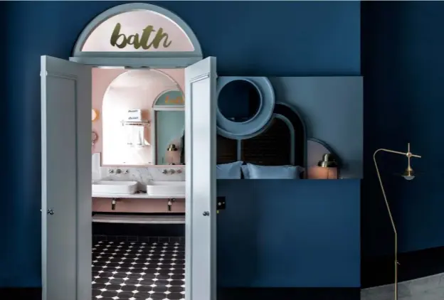  ??  ?? Bathroom ‘Pink Ground’ by Farrow & Ball is a good match for the colour of these walls. The curved shape of the marble vanity unit, designed by Chzon, echoes the soft geometry used throughout the hotel. The wall-mounted crosshead taps are by Lefroy...