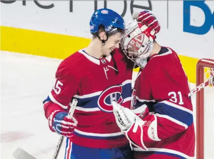  ?? DAVE SIDAWAY ?? Jesperi Kotkaniemi congratula­tes goaltender Carey Price after the Habs scored three goals in the third period to defeat the Washington Capitals 6-4 Thursday night at the Bell Centre. Kotkaniemi collected the puck from his first NHL goal and later said he would give it to his mother.