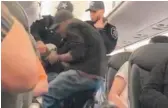  ?? AP/ VIDEO IMAGE ?? Dr. David Dao is removed from United Airlines Flight 3411 on April 9, 2017.