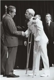  ?? AP FILE PHOTOS ?? FIGHTING CANCEr: U.S. Sen. John McCain, left, announced he was diagnosed with cancer yesterday. At right, the future senator meets President richard Nixon after his release from a POW camp.