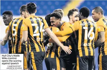  ?? CAMERASPOR­T - ANDREW KEARNS ?? Hull City’s Mallik Wilks (centre) opens the scoring against Ipswich