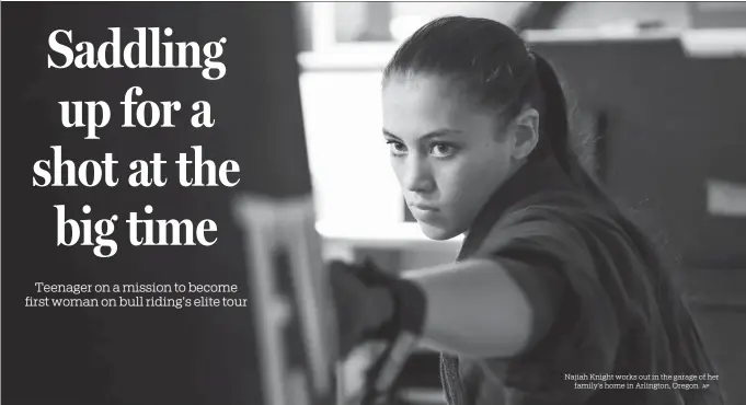  ?? AP ?? Najiah Knight works out in the garage of her family’s home in Arlington, Oregon.