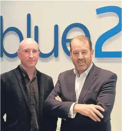  ??  ?? Chris Gilchrist with Blue2 Digital managing director Scott Mccallum.