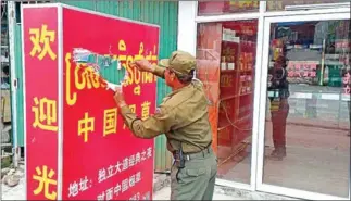  ?? SUPPLIED ?? In Sihanoukvi­lle at least 391 banners with spelling errors, including the ones showing the Chinese letters bigger than Khmer, have been removed by the authoritie­s so far this year.