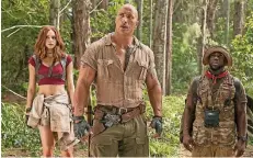  ?? FOTO: DPA ?? Dwayne Johnson (M.) mit Karen Gillan und Kevin Hart.