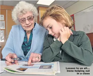  ?? Pictures: SWNS ?? Lesson to us all... Irene helping out in a class