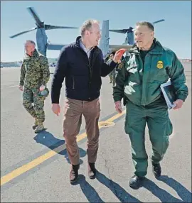  ?? Pablo Martinez Monsivais AFP/Getty Images ?? ACTING Defense Secretary Patrick Shanahan, left, and El Paso Sector Chief Aaron Hull after touring the U.S.-Mexico border in February in an Osprey.