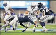  ?? [AP PHOTO/DAVID ZALUBOWSKI] ?? Altus native and Air Force fullback Taven Birdow (33) has rushed for 563 yards and five touchdowns on 126 carries this season.