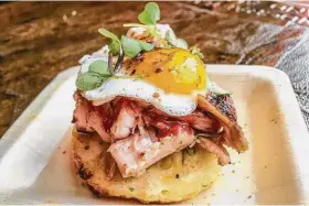  ?? Gary Wise ?? Gatlin’s BBQ served smoked rabbit on cheddar-chive biscuit with raspberry-chipotle sauce, topped with a quail egg at last year’s event.