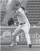  ?? KAREEM ELGAZZAR/THE ENQUIRER ?? Cincinnati Reds starting pitcher Luis Castillo (58) delivers in the first inning of a game against Milwaukee on Monday at Great American Ball Park in Cincinnati.