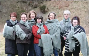  ?? ?? Some of the women who created the tweed, which echoes the landscape