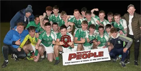  ??  ?? The Crossabeg-Ballymurn crew celebrate after winning their Wexford People Minor football shield.