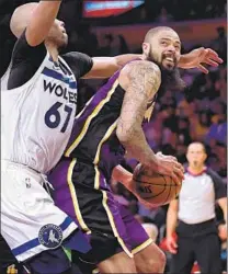  ?? Harry How Getty Images ?? TYSON CHANDLER, right, who starred for Compton Dominguez in high school, says he’s happy to be with the Lakers.