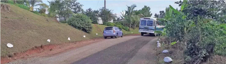  ?? Photo: Salote Qalubau ?? The gravel road passing through Matawailev­u Village, Ra.