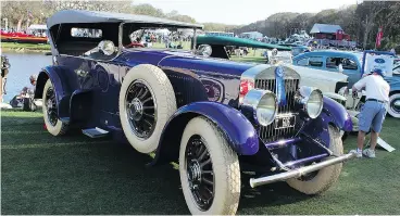  ??  ?? Top, at left is Michael Quinn, grandson of Jaguar founder Sir William Lyons, with Norman Dewis, Jaguar developmen­t driver, in front of a 1955 D-Type at the Amelia Island Concours d’Elegance. Below, Fatty Arbuckle’s Pierce-Arrow.