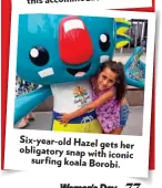  ??  ?? Six-year-old Hazel gets her obligatory snap with iconic surfingkoa­la Borobi.