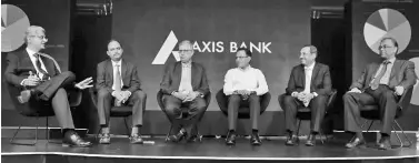  ??  ?? Fund managers during a panel discussion organised by Axis Bank at the launch of its private banking platform ‘Burgundy Private’
