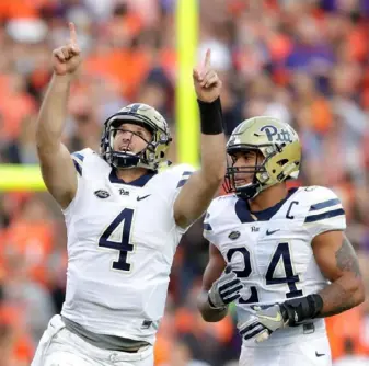  ?? Streeter Lecka/Getty Images ?? Quarterbac­k Nathan Peterman, left, and running back James Conner helped lead the Panthers to an upset of Clemson in the regular season two years ago.