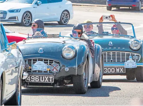  ?? ?? AND THEY’RE OFF!: Enthusiast­s rev up for their 140-mile Strathmore Classic Car Tour around the north east.