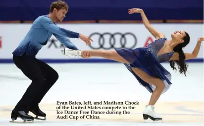  ??  ?? Evan Bates, left, and Madison Chock of the United States compete in the Ice Dance Free Dance during the Audi Cup of China