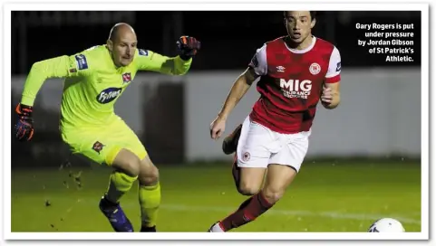  ??  ?? Gary Rogers is put under pressure by Jordan Gibson of St Patrick’s Athletic.