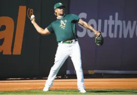  ?? Paul Chinn / The Chronicle ?? A’s starting pitcher Frankie Montas was suspended for 80 games last season after testing positive for a banned substance, but he returned to make a start in the last week of the season. Teammates say he looks primed for the upcoming season.