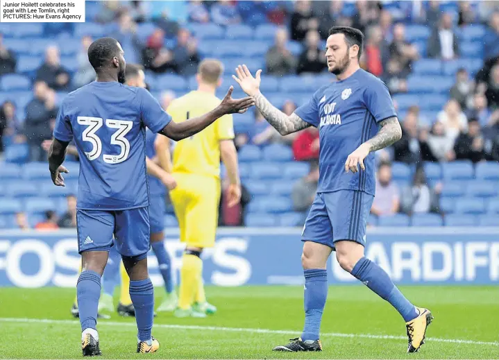  ??  ?? Junior Hoilett celebrates his goal with Lee Tomlin, right PICTURES: Huw Evans Agency