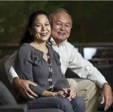  ?? TARA WALTON/TORONTO STAR FILE PHOTO ?? Raymond Chang and his wife, Donette Chin-Loy, in their Toronto home. Chang, a former chancellor of Ryerson University, died Sunday at 65.