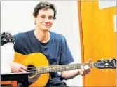  ??  ?? Doctoral psychology researcher Ryan Sutcliffe is combining his musical and academic interests in a study to see if learning an instrument later in life will slow the inevitable decline in brain function.