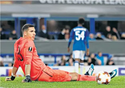  ??  ?? Floored: Everton’s Joel Robles lies dejected after conceding the third goal