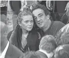  ??  ?? Mary- Kate Olsen and Olivier Sarkozy, shown in November 2012, are getting divorced after five years of marriage. JAMES DEVANEY/ WIREIMAGE