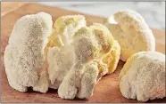  ?? PHOTOS BY TOM MCCORKLE FOR THE WASHINGTON POST ?? Lion’s mane fried rice, left, and lion’s mane mushrooms, above.