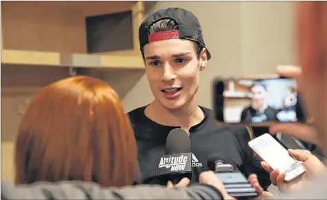  ?? EMILY WADE/ COLORADO AVALANCHE SOCIAL MEDIA ?? Ryan Graves speaks with reporters following his Dec. 27 NHL debut.