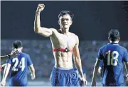  ?? ?? Thailand striker Adisak Kraisorn celebrates after scoring against Turkmenist­an.