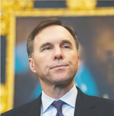  ?? ADRIAN WYLD / THE CANADIAN PRESS ?? Minister of Finance Bill Morneau has had a difficult juggling act in trying to implement Liberal campaign promises while keeping deficits under control, John Ivison writes.