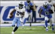  ?? ASSOCIATED PRESS FILE ?? Titans running back DeMarco Murray (29) is pursued by Detroit’s Darius Slay (23) last season.