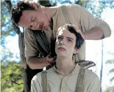  ?? SODA PICTURES ?? Michael Fassbender looks after Kodi Smit-McPhee in Slow West. The cowboy movie was shot in New Zealand.