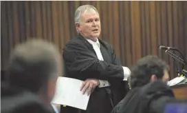  ??  ?? TEARING INTO INVESTIGAT­ORS. Barry Roux, Oscar Pistorius’s lawyer, may be able to prevent his client having to testify.