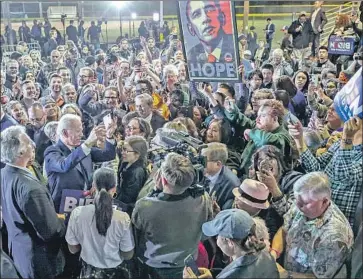  ?? Robert Gauthier Los Angeles Times ?? JOE BIDEN greets supporters at the Baldwin Hills Recreation Center in Los Angeles. The former vice president’s surge on Super Tuesday dashed any hopes Bernie Sanders held of gaining an insurmount­able lead.