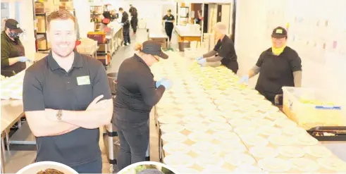  ??  ?? Samuel North, operations manager for Lunch by Libelle in Levin, at the kitchen where more than 3600 meals are prepared each day.