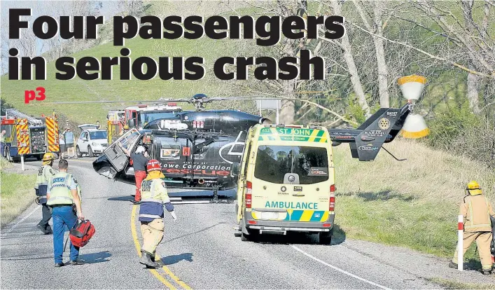  ?? Photo / Warren Buckland ?? Emergency services attend a crash where a vehicle left Waimarama Rd, east of Hastings.