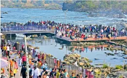  ?? —
PTI ?? Tourists visit Bhedaghat waterfall amid concerns over spread of Omicron variant of Covid-19, in Jabalpur on Monday.