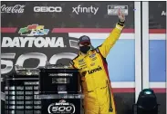 ?? JOHN RAOUX — THE ASSOCIATED PRESS ?? Michael McDowell celebrates after winning the NASCAR Daytona 500auto race at Daytona Internatio­nal Speedway, Monday, in Daytona Beach, Fla.