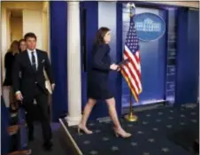  ?? EVAN VUCCI — THE ASSOCIATED PRESS ?? White House press secretary Sarah Huckabee Sanders arrives for the daily press briefing at the White House, Monday in Washington.