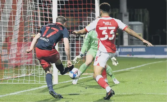  ??  ?? Elliot Embleton strikes the post against Fleetwood