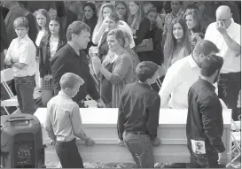  ?? Associated Press photo ?? Youths and men carry a coffin during the funeral of Dawna Ray Langford, 43, and her sons Trevor, 11, and Rogan, 2, who were killed by drug cartel gunmen, at the cemetery in La Mora, Sonora state, Mexico, Thursday. Three women and six of their children, all members of the extended LeBaron family, died when they were gunned down in an attack while travelling along Mexico’s Chihuahua and Sonora state border on Monday.