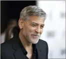  ??  ?? Clooney